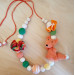 Fox baby set: teething necklace and crochet baby rattle